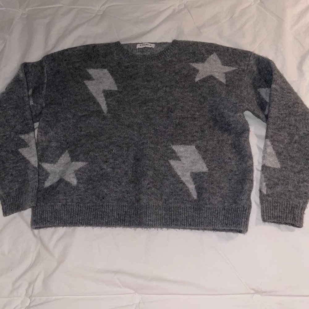 Storia lightning bolt and star preppy sweater